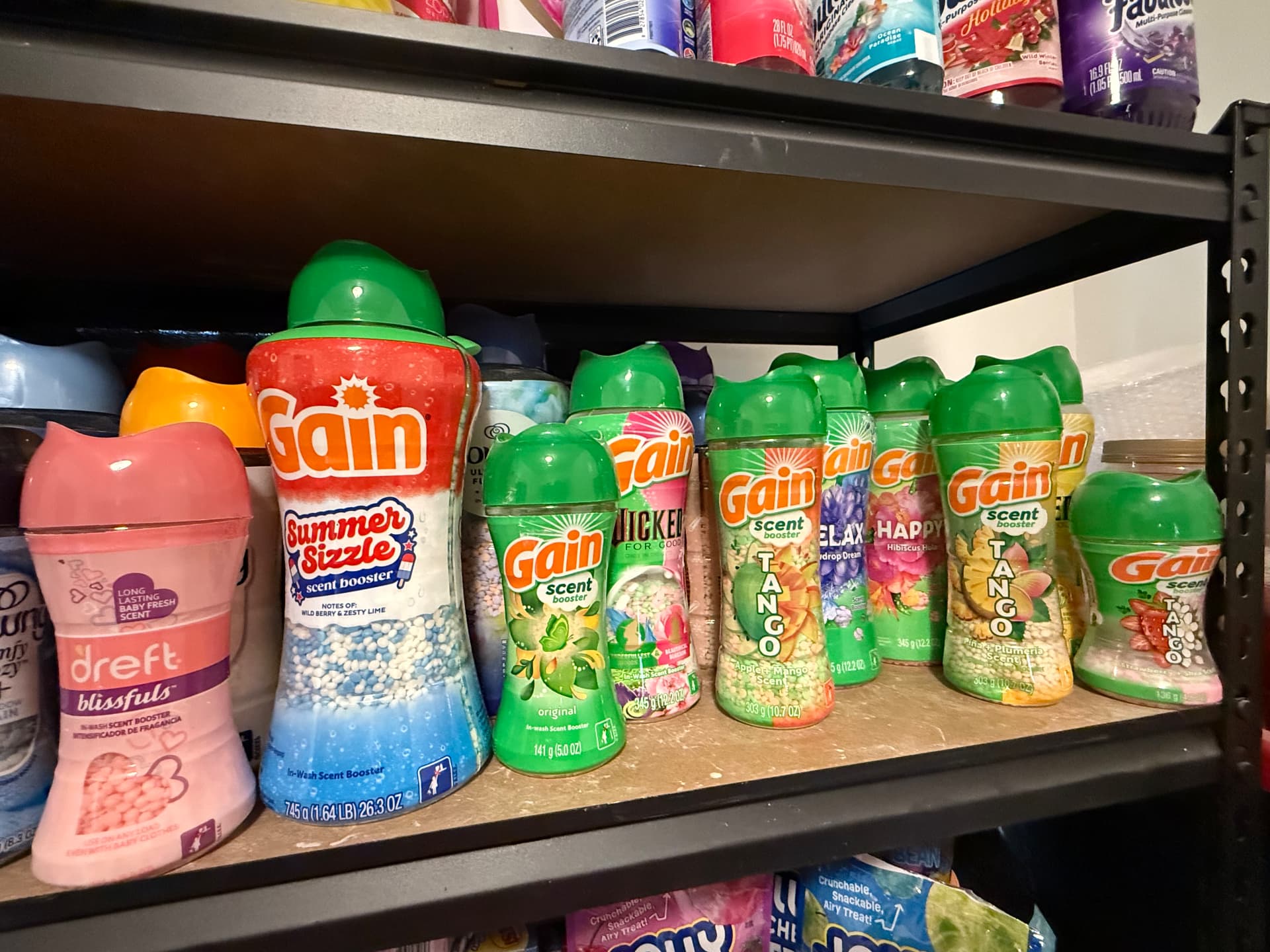 Shelf of in-wash scent boosters used for cornstarch scents